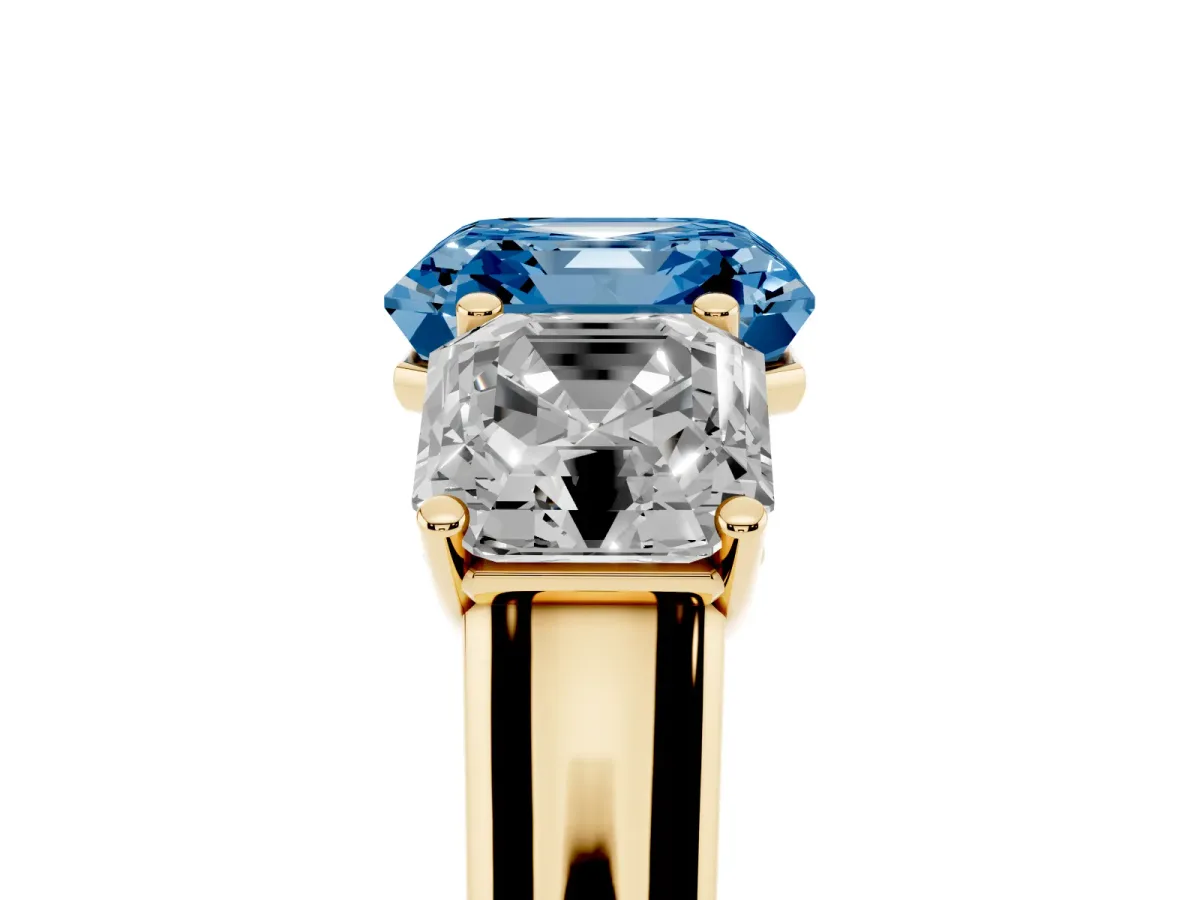 Fancy Blue Asscher Cut Three-Stone Diamond Ring with Prong Setting on a Classic Band Yellow gold