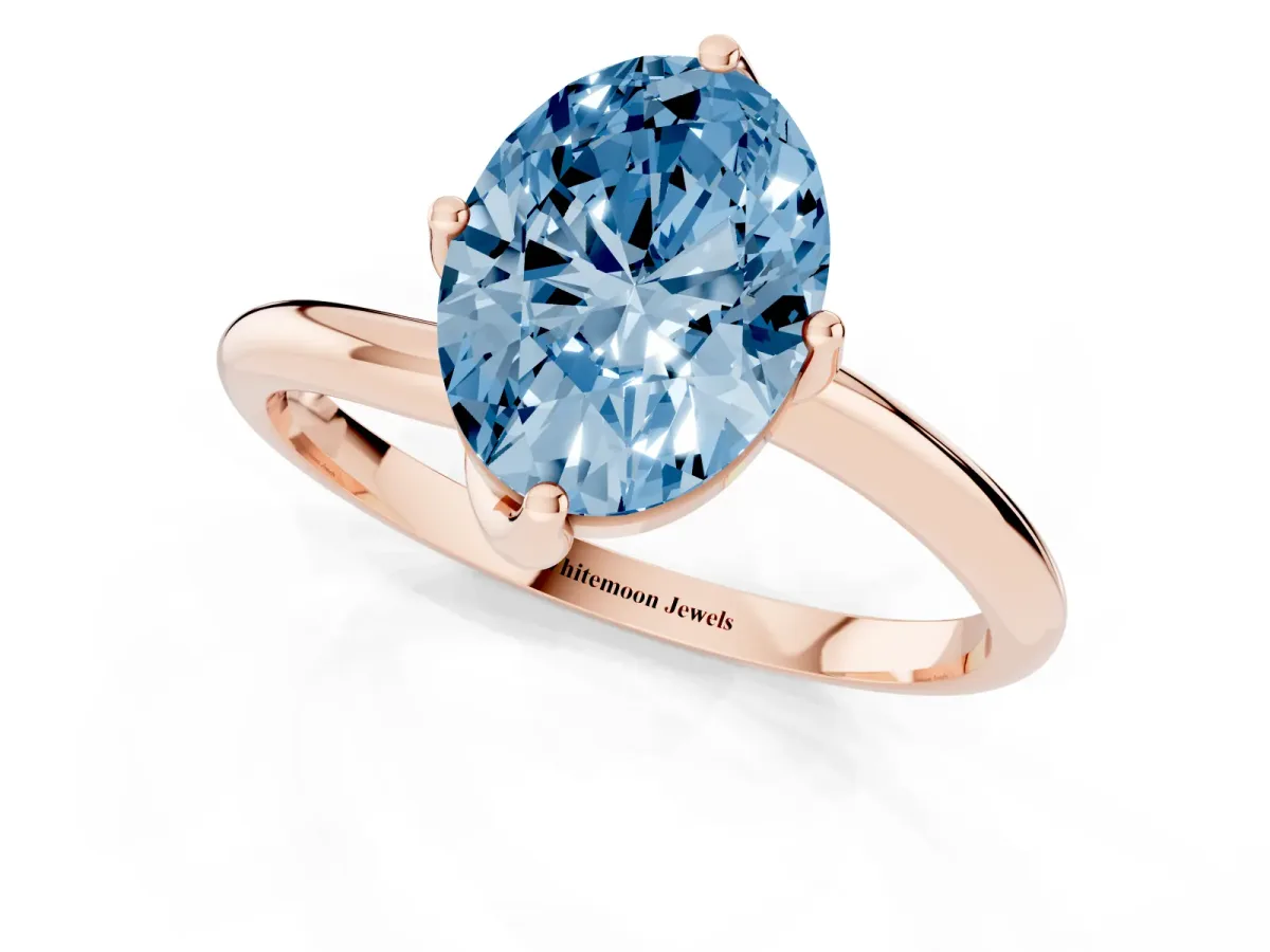Fancy Blue Oval Cut Diamond Solitaire Engagement Ring with Four-Prong Setting and Classic Band Rose gold