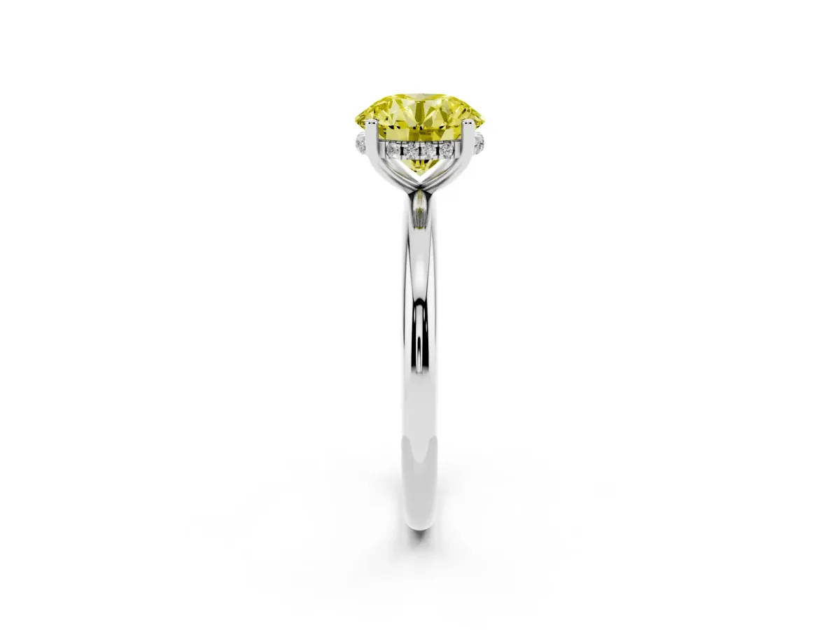 Fancy Yellow Round Cut Cut Solitaire Engagement Ring with Four-Prong Setting and Classic Band Silver