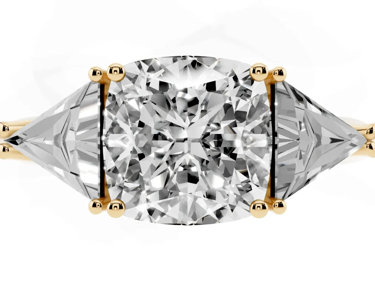 Three-Stone Cushion Cut Diamond Engagement Ring with Trillion Side Stones and Prong Setting Yellow gold