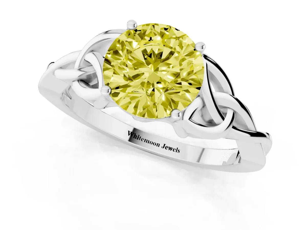 Fancy Yellow Round Cut Diamond Solitaire Engagement Ring with Celtic Knot Band and Four-Prong Setting White gold