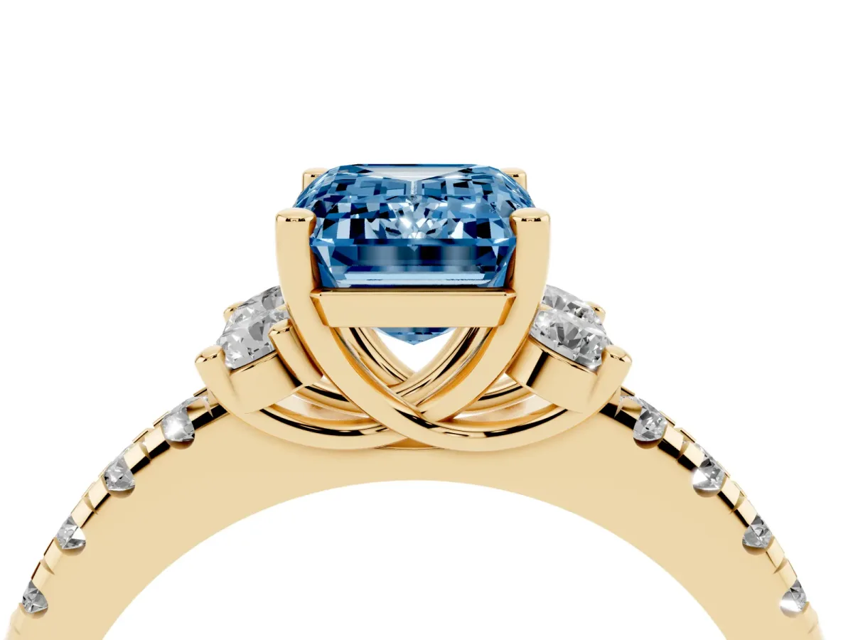 Fancy Blue Emerald Cut Diamond Three-Stone Pave Band with Four-Prong Setting Yellow gold