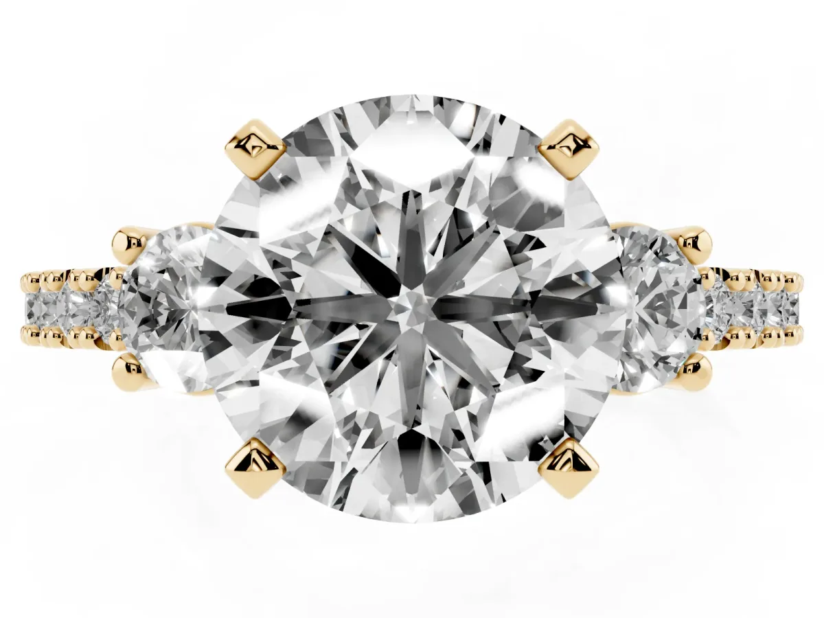 Round Cut Three-Stone Diamond Pavé Band with Prong Setting Yellow gold