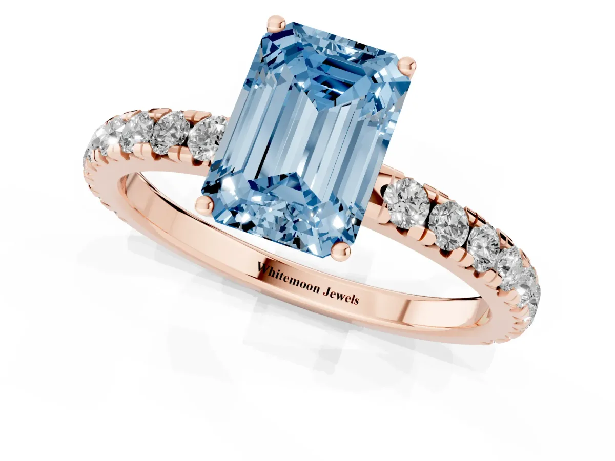 Fancy Blue Emerald Cut Diamond Pavé Solitaire Engagement Ring with Four-Prong Setting Rose gold