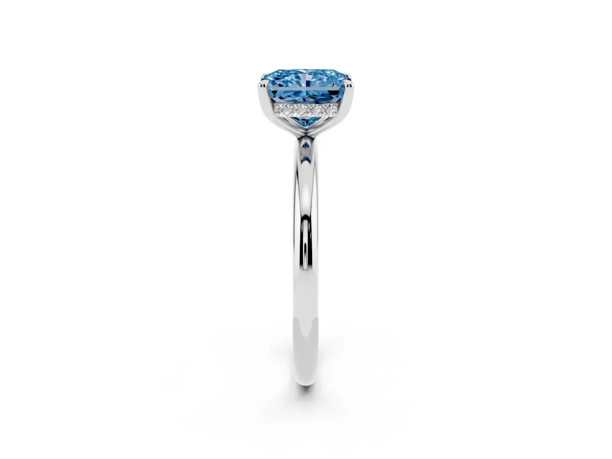 Fancy Blue Radiant Cut Diamond Solitaire Ring with Thin Band and Four-Prong Setting Silver