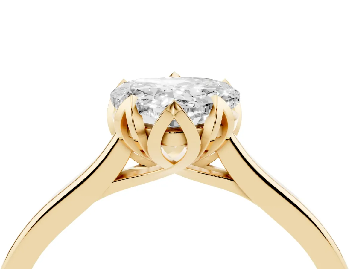 Heart Cut Diamond Solitaire Ring with Flower Prong Setting and Classic Band Yellow gold
