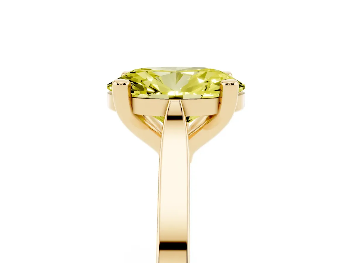 Fancy Yellow Oval Cut Solitaire Diamond Ring with Four-Prong Setting and Tapered Band Yellow gold