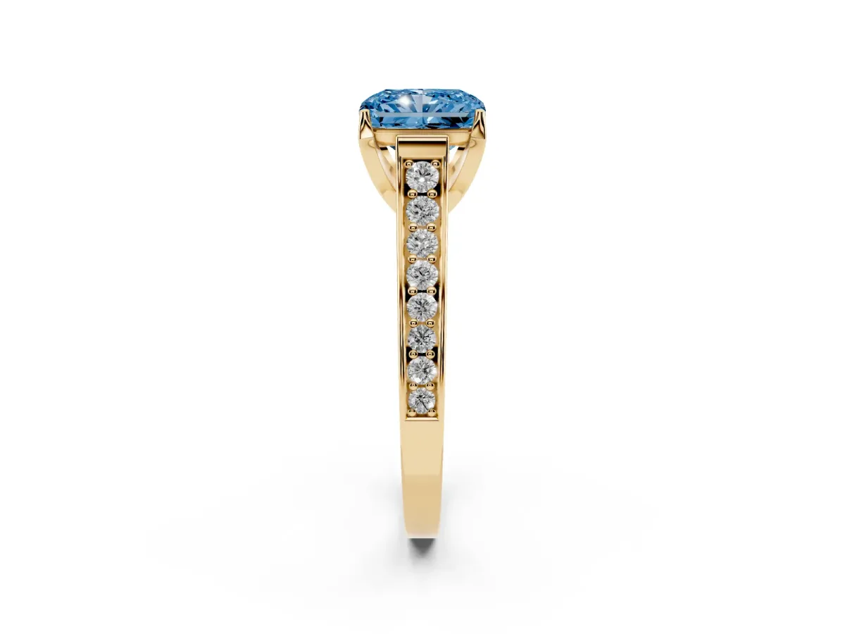 Fancy Blue Radiant Cut Brilliant Cut Diamond Engagement Ring with Pavé Band and Four-Prong Setting Yellow gold