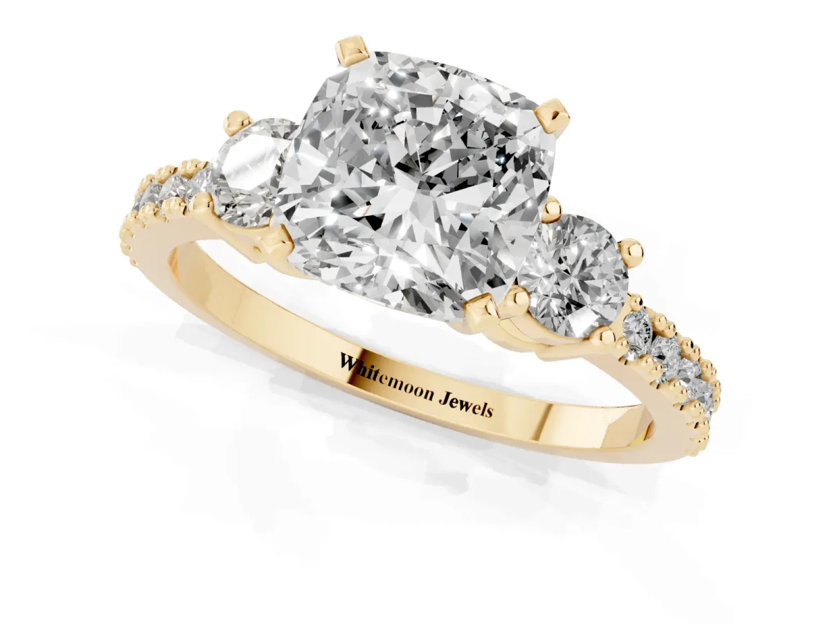 Cushion Cut Three-Stone Diamond Pavé Band with Prong Setting Yellow gold