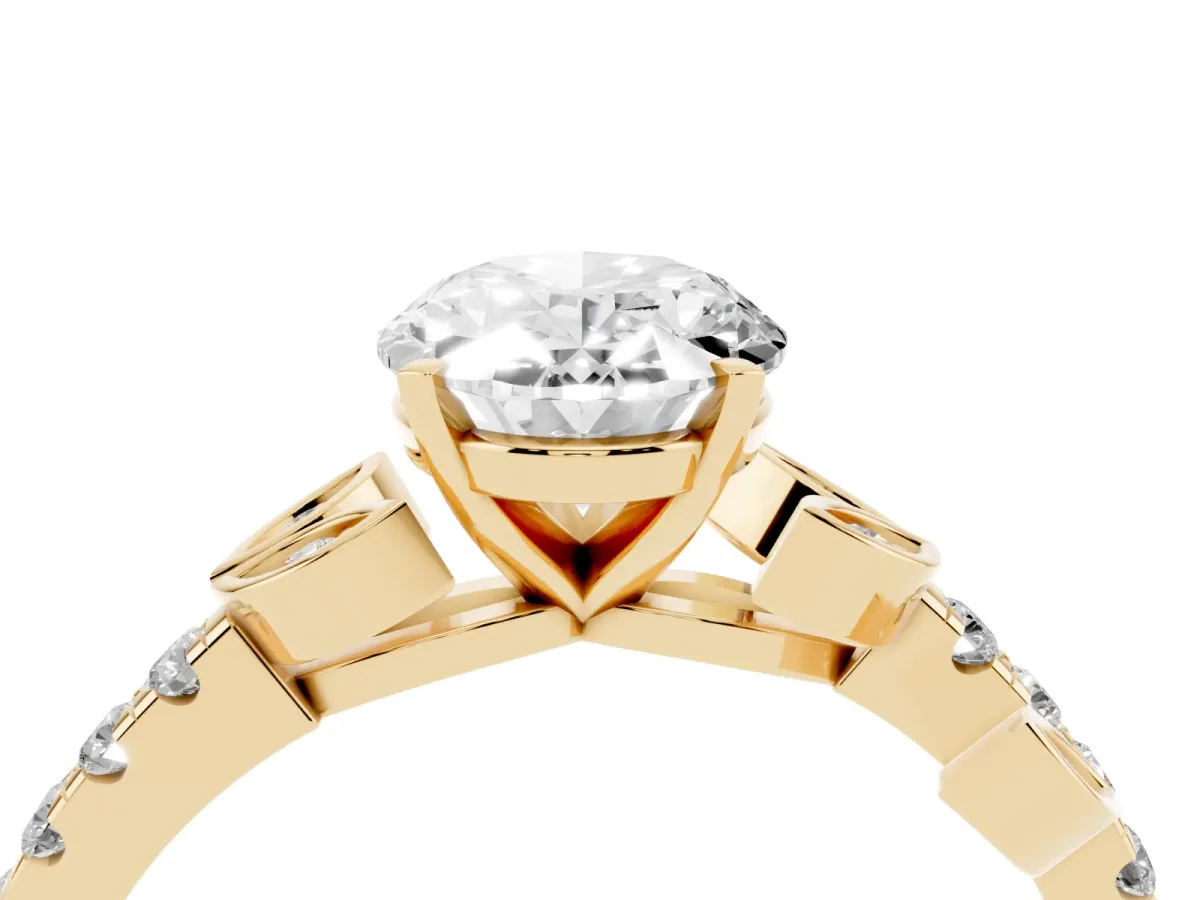 Oval Cut Solitaire Leaf-Inspired Diamond Ring with Pavé Band and Four-Prong Setting Yellow gold