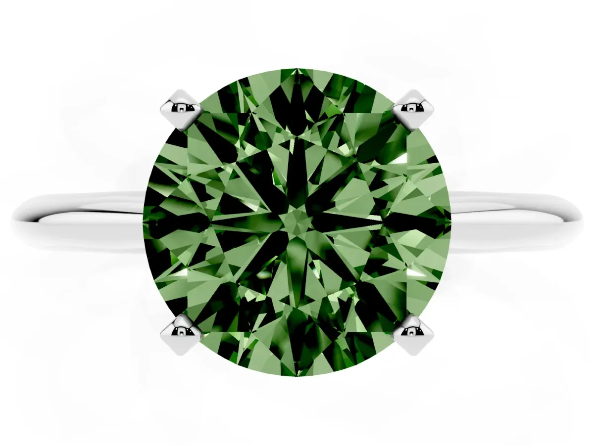 Fancy Green Round Cut Cut Solitaire Ring with Four-Prong Setting on a Classic Band Silver