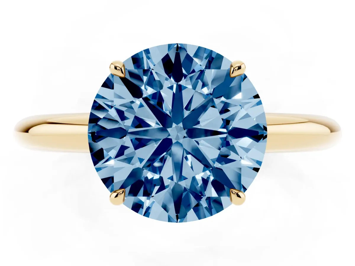 Fancy Blue Round Cut Brilliant Solitaire Engagement Ring with Six-Prong Setting and Classic Band Yellow gold