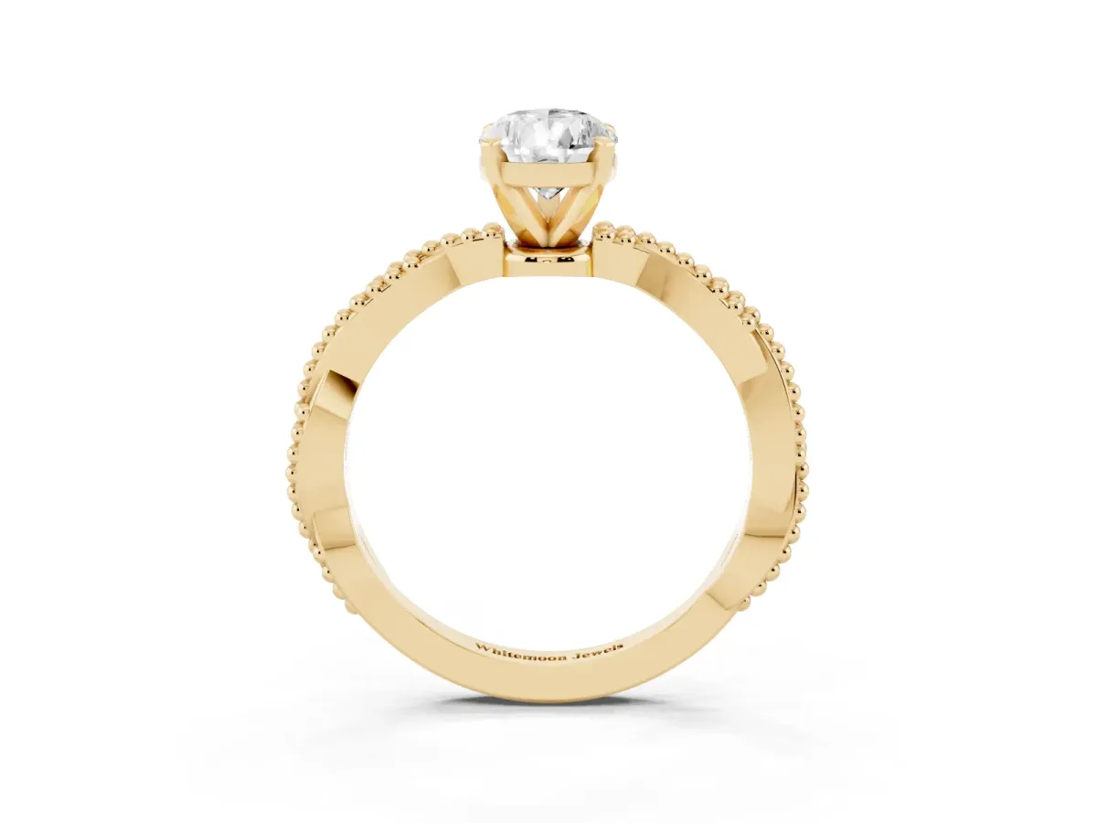 Pear Cut Solitaire Twisted Band with Bead Prong Setting Yellow gold