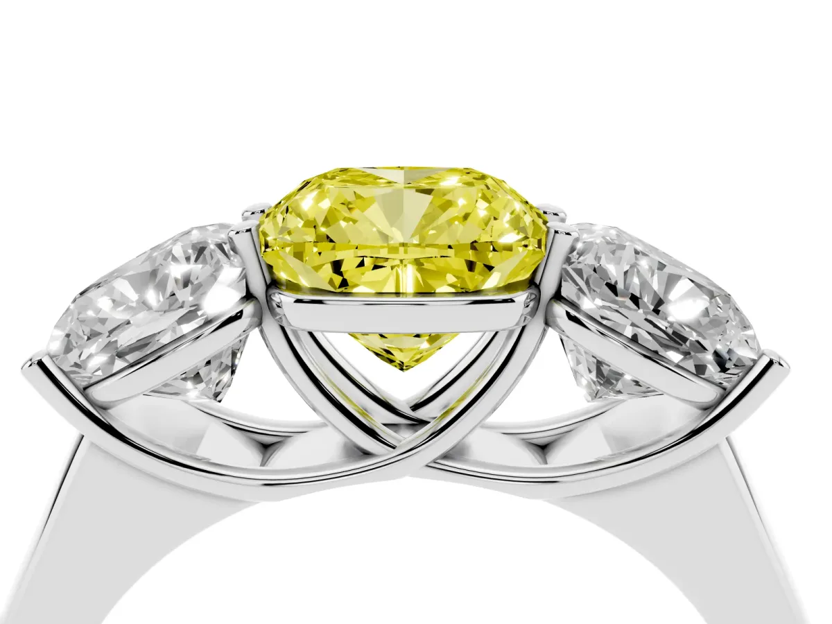 Fancy Yellow Cushion Cut Three-Stone Diamond Ring with Prong Setting on a Classic Band Platinum