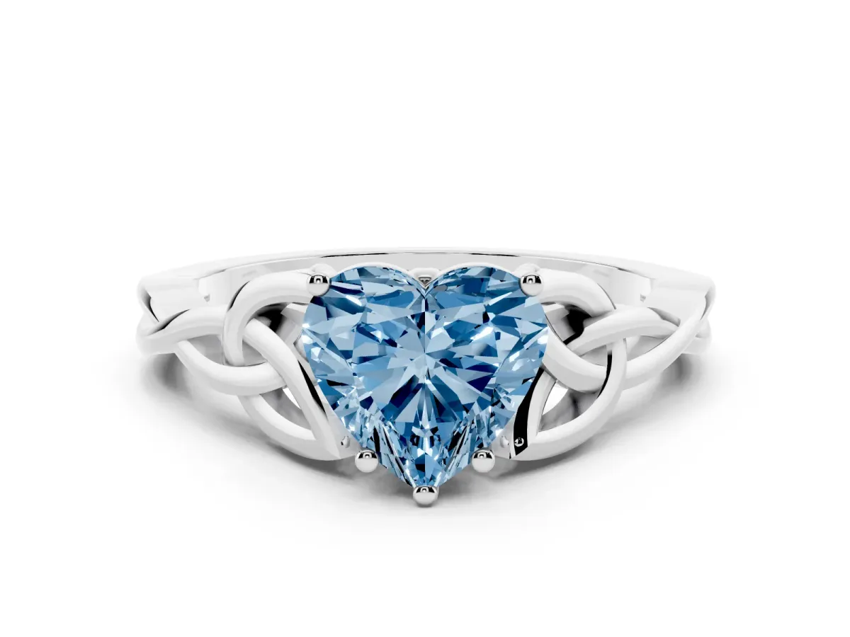 Fancy Blue Heart Cut Diamond Solitaire Engagement Ring with Celtic Knot Band and Four-Prong Setting Silver