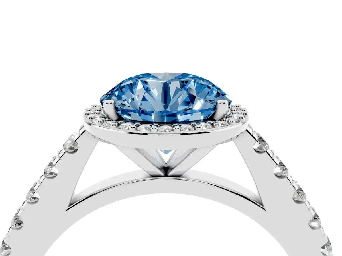 Fancy Blue Round Cut Cut Halo Diamond Engagement Ring with Pave Band and Four-Prong Setting Silver