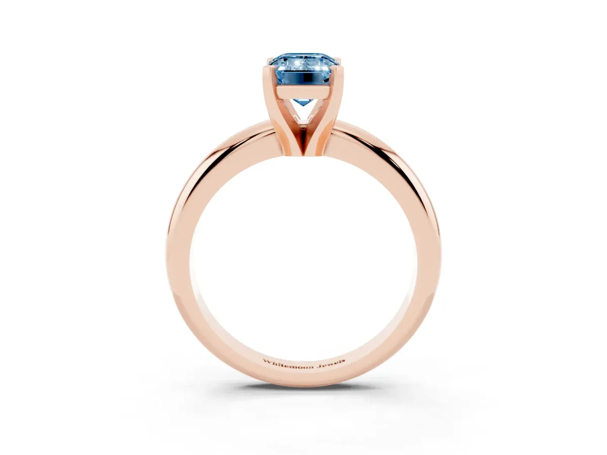 Fancy Blue Emerald Cut Diamond Solitaire Engagement Ring with Round Band and Four-Prong Setting Rose gold