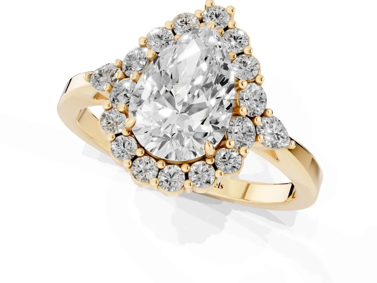 Pear Cut Diamond Halo Ring with Pear Side Stones and Prong Setting Yellow gold