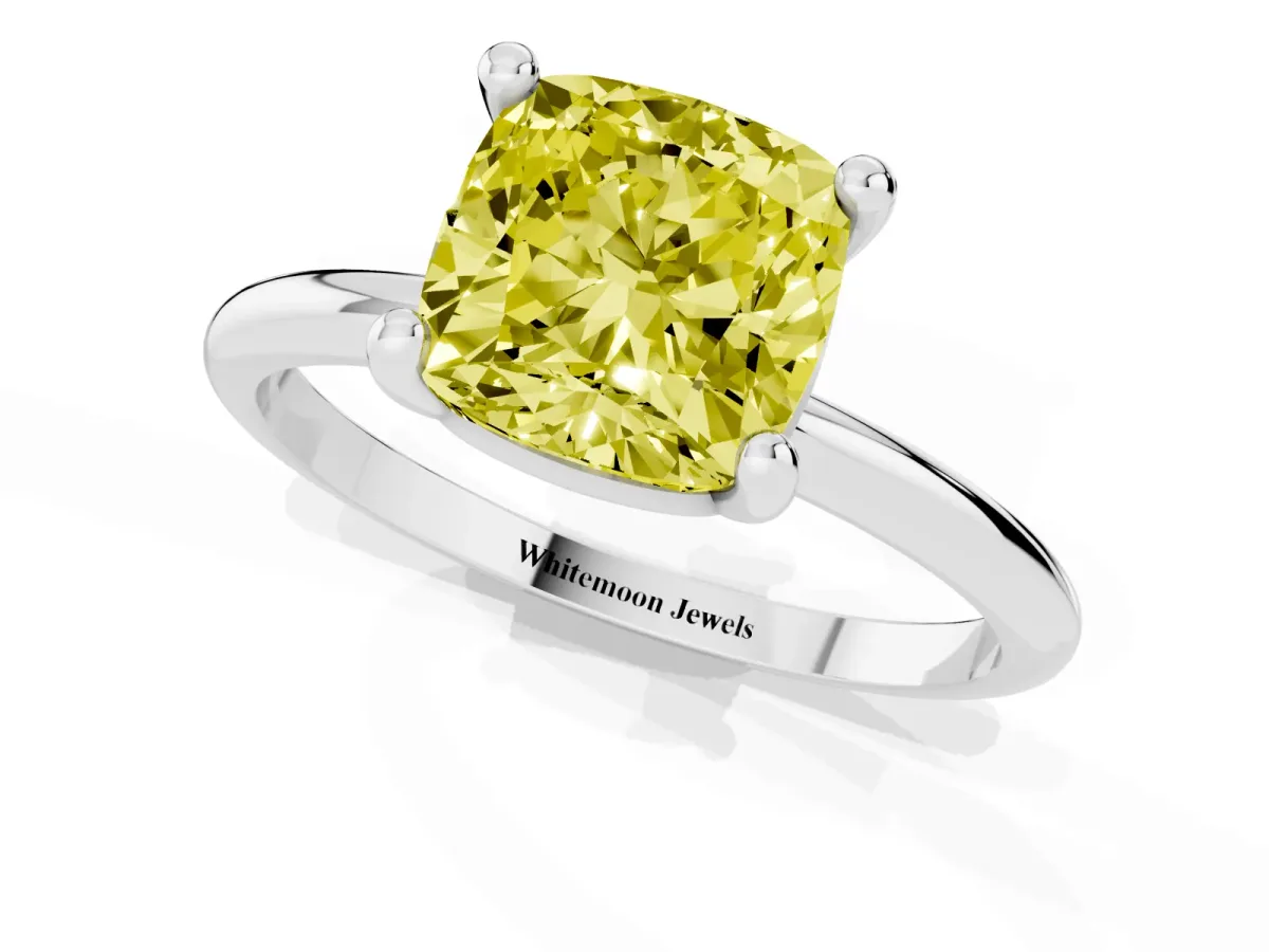 Fancy Yellow Cushion Cut Solitaire Diamond Ring with 4-Prong Setting on a Classic Band Silver