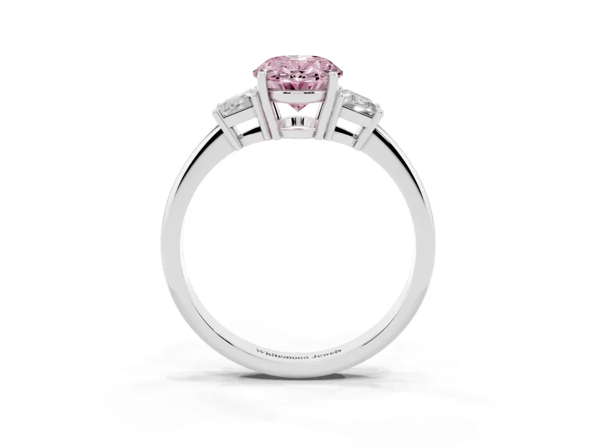 Fancy Pink Oval Cut Diamond Three-Stone Ring with Trapezoid Side Stones and Prong Setting Silver
