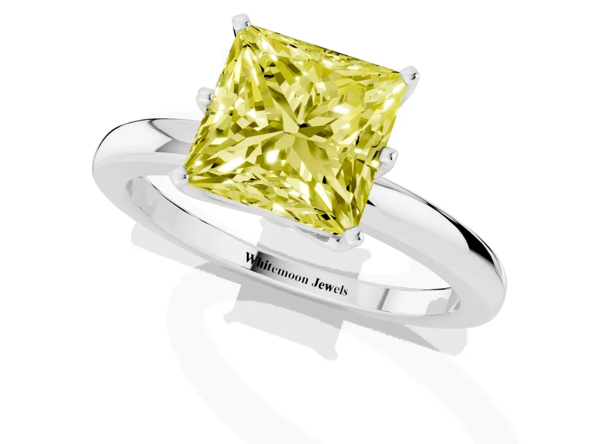 Fancy Yellow Princess Cut Solitaire Diamond Ring with Six-Prong Setting on a Classic Band Silver