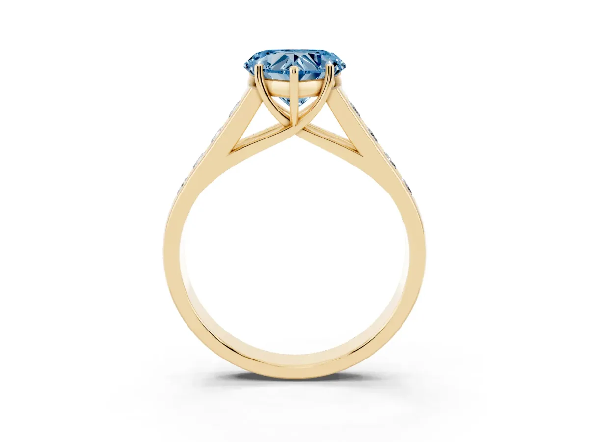 Fancy Blue Heart Cut Solitaire Channel-Set Diamond Engagement Ring with Four-Prong Setting Yellow gold