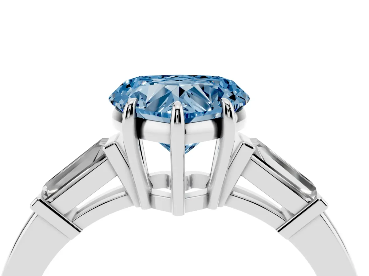 Fancy Blue Heart Cut Diamond Three-Stone Ring with Tapered Baguette Side Stones and Prong Setting Silver