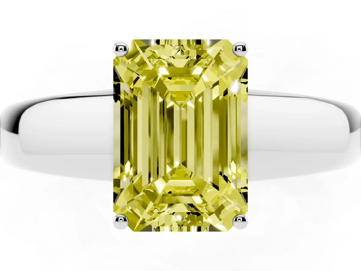 Fancy Yellow Emerald Cut Solitaire Diamond Ring with Tapered Band and Four-Prong Setting Silver