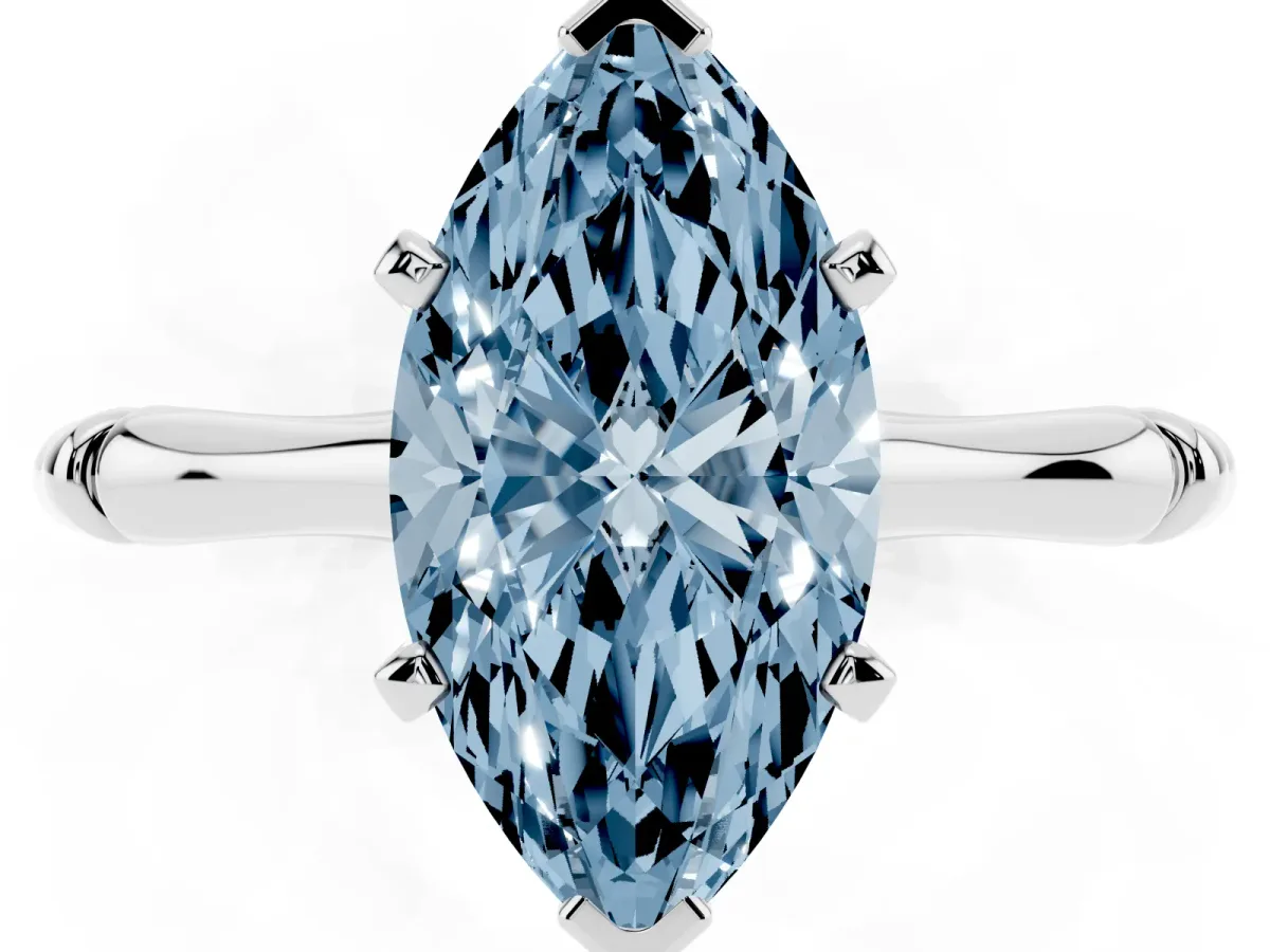 Fancy Blue Marquise Cut Solitaire Diamond Ring with Bamboo Band and Four-Prong Setting Silver