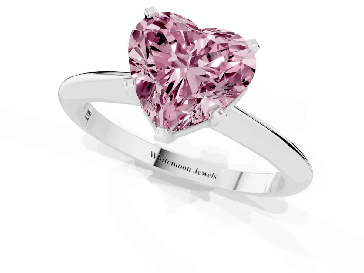 Fancy Pink Heart Cut Cut Solitaire Ring with Four-Prong Setting on a Classic Band Silver