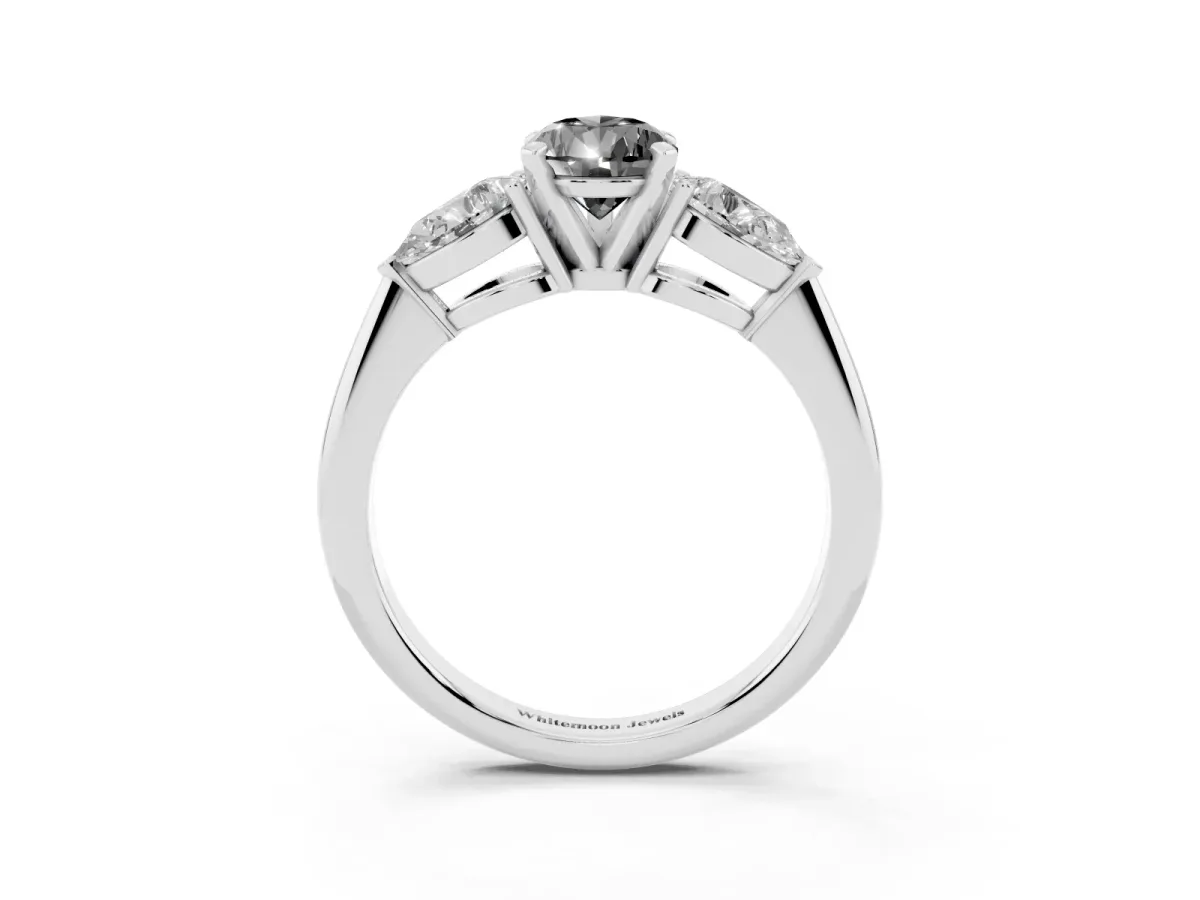 Fancy Black Three-Stone Pear Cut Diamond Ring with Pear Side Stones and Four-Prong Setting Platinum