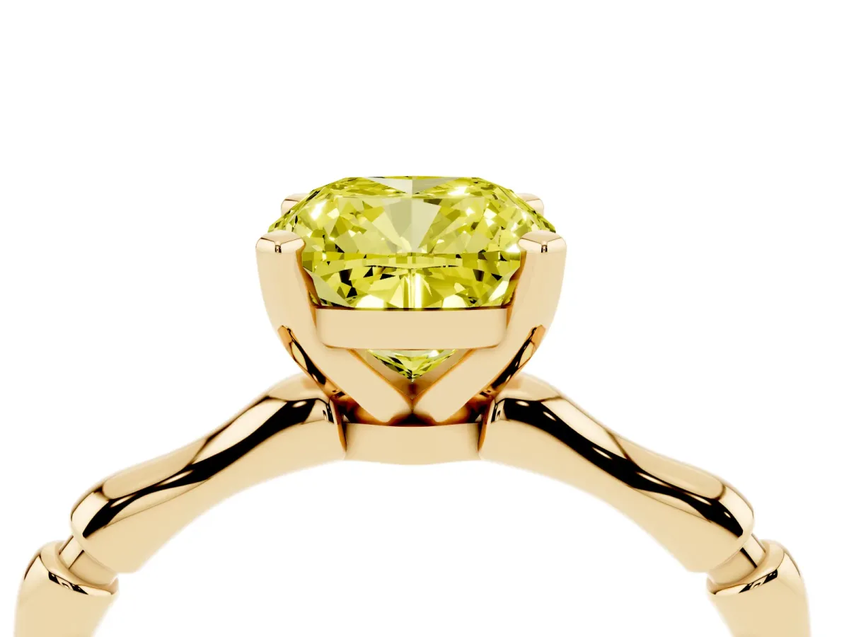 Fancy Yellow Cushion Cut Solitaire Diamond Ring with Bamboo Band and Four-Prong Setting Yellow gold