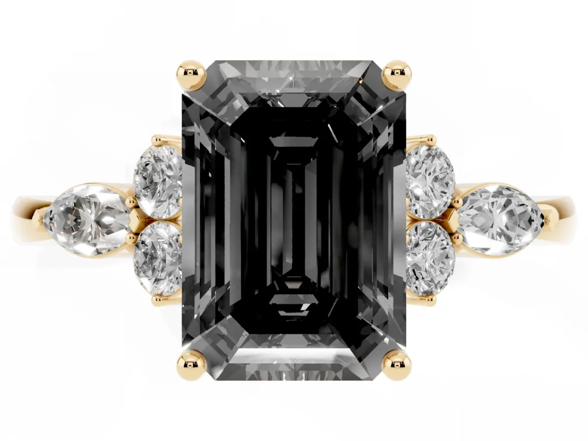 Fancy Black Emerald Cut Brilliant Diamond Solitaire Ring with Pear Side Stones and Four-Prong Setting Yellow gold