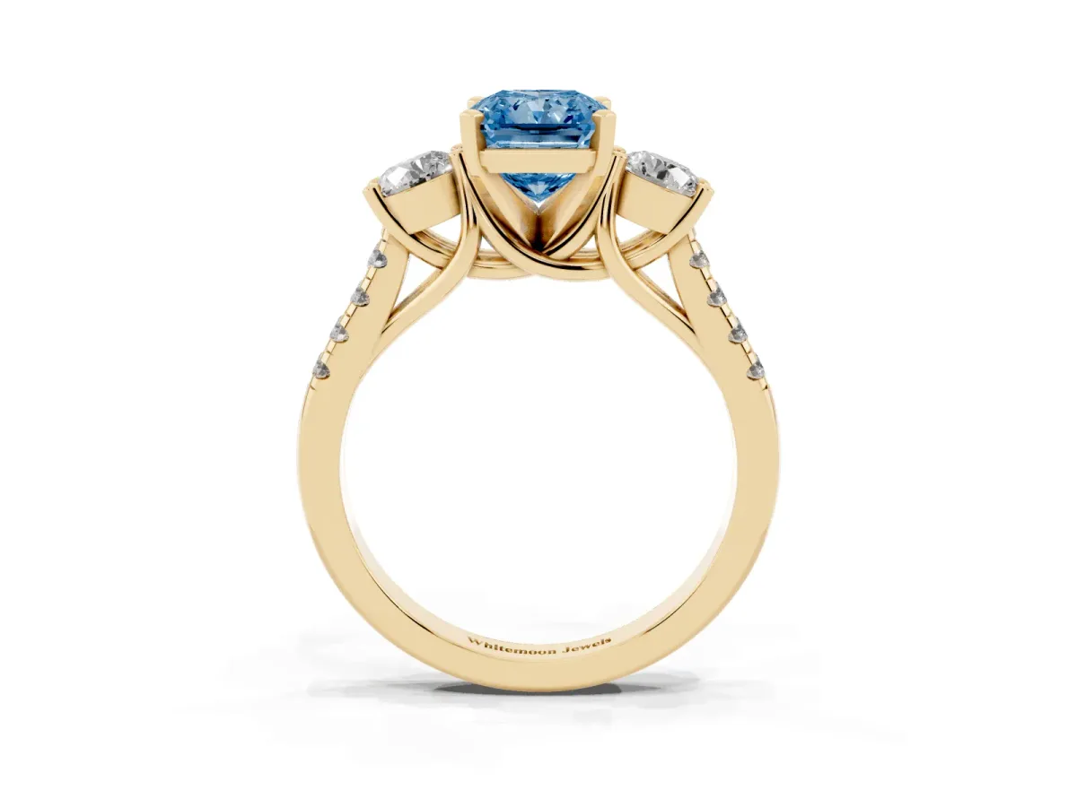 Fancy Blue Three-Stone Radiant Cut Diamond Pavé Band with Four-Prong Setting Yellow gold