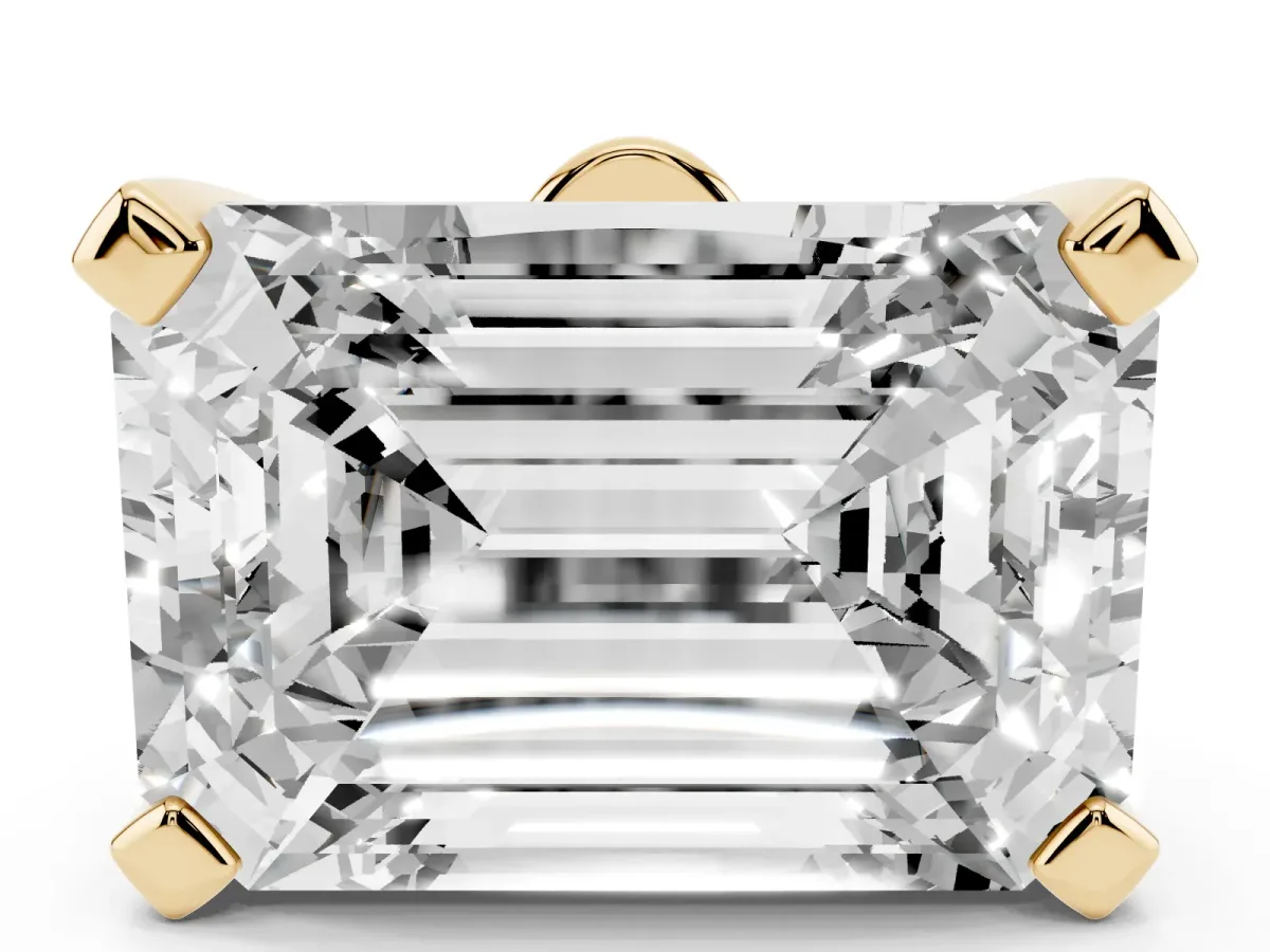 Emerald Cut Diamond Solitaire Ring with Prong Setting and Classic Band Yellow gold