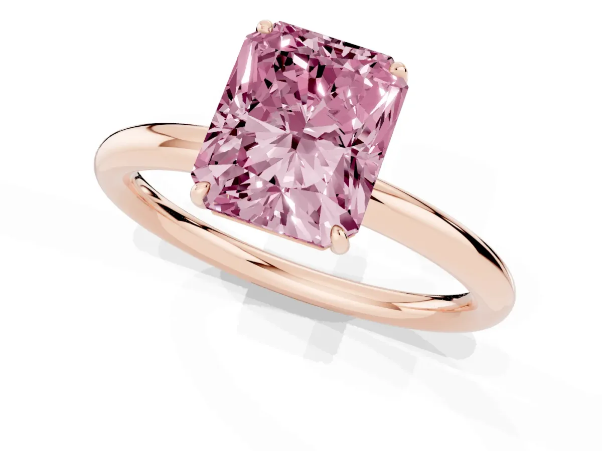 Fancy Pink Radiant Cut Solitaire Diamond Ring with Four-Prong Setting on a Plain Band Rose gold
