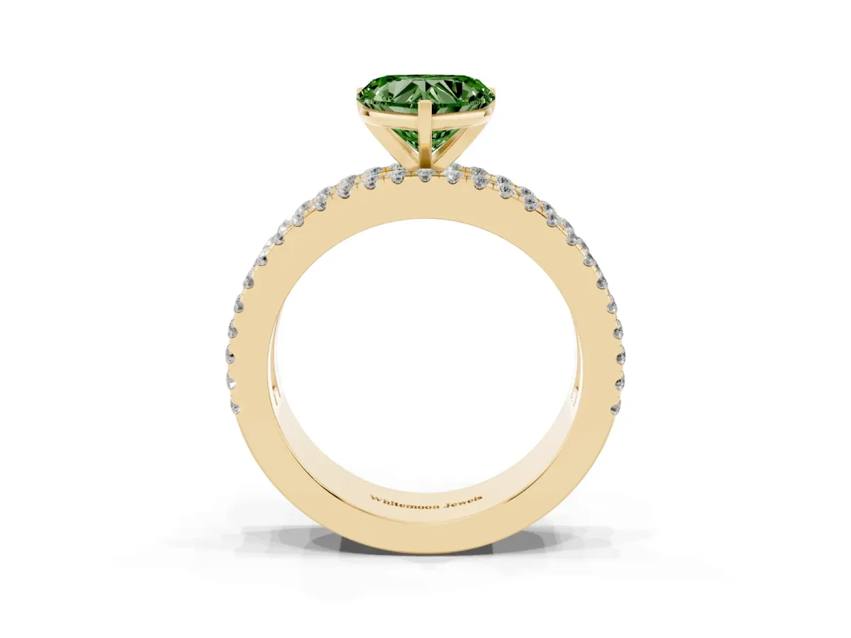 Fancy Green Heart Cut Diamond Solitaire Ring with Pavé and Channel Set Band Yellow gold