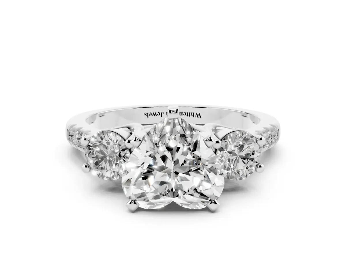 Three-Stone Heart Cut Diamond Pavé Band with Four-Prong Setting Platinum