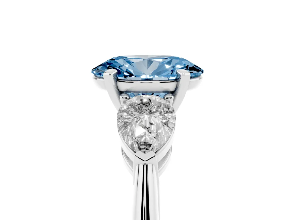 Fancy Blue Three-Stone Oval Cut Diamond Ring with Pear Side Stones and Four-Prong Setting Platinum