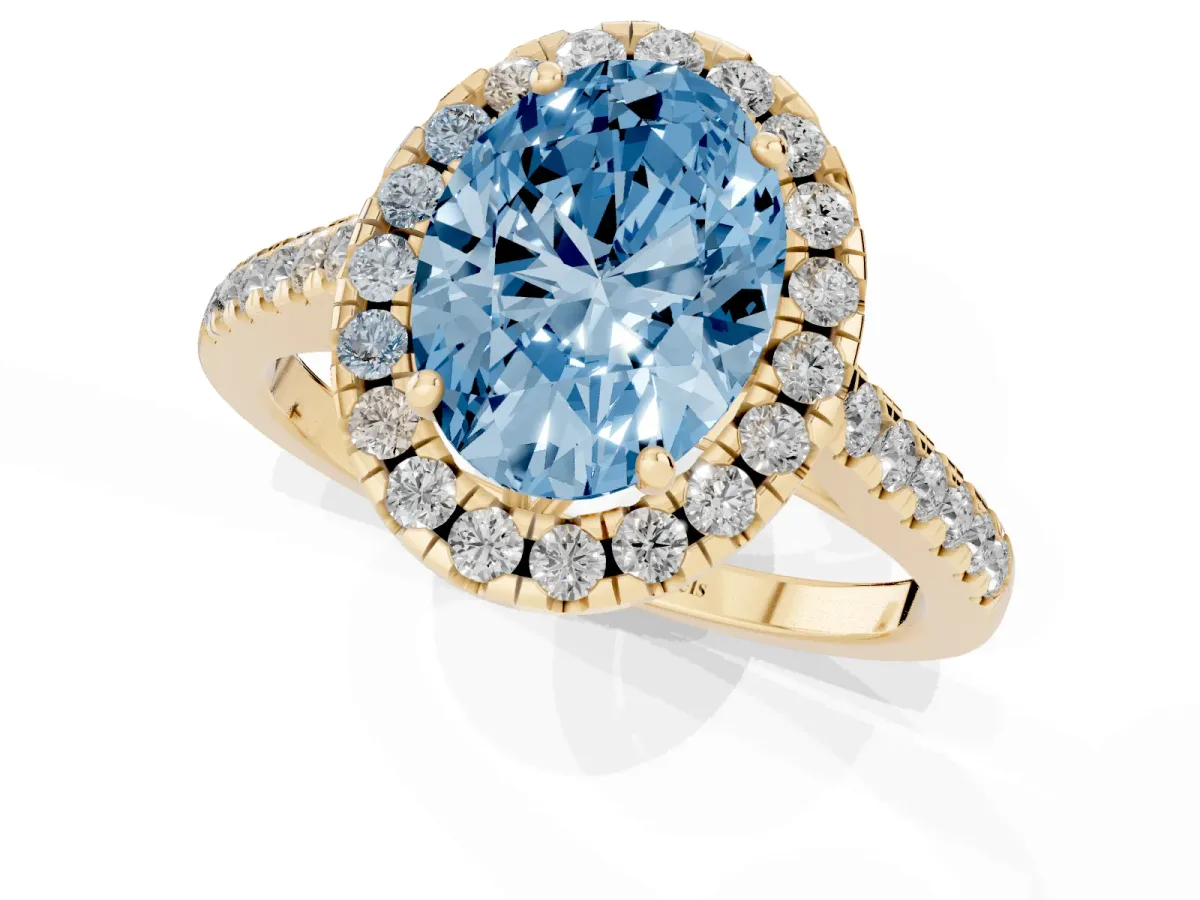 Fancy Blue Oval Cut Halo Pavé Diamond Engagement Ring with Four-Prong Setting Yellow gold