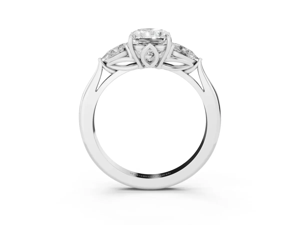 Three-Stone Radiant Cut Diamond Ring with Pear Side Stones in Four-Prong Setting Silver