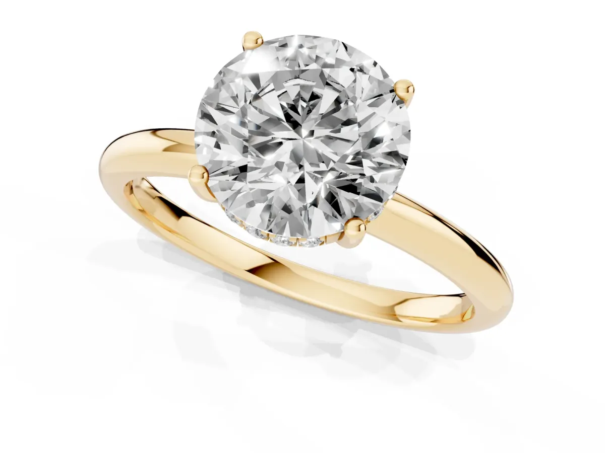 Round Cut Cut Solitaire Engagement Ring with Four-Prong Setting and Classic Band Yellow gold
