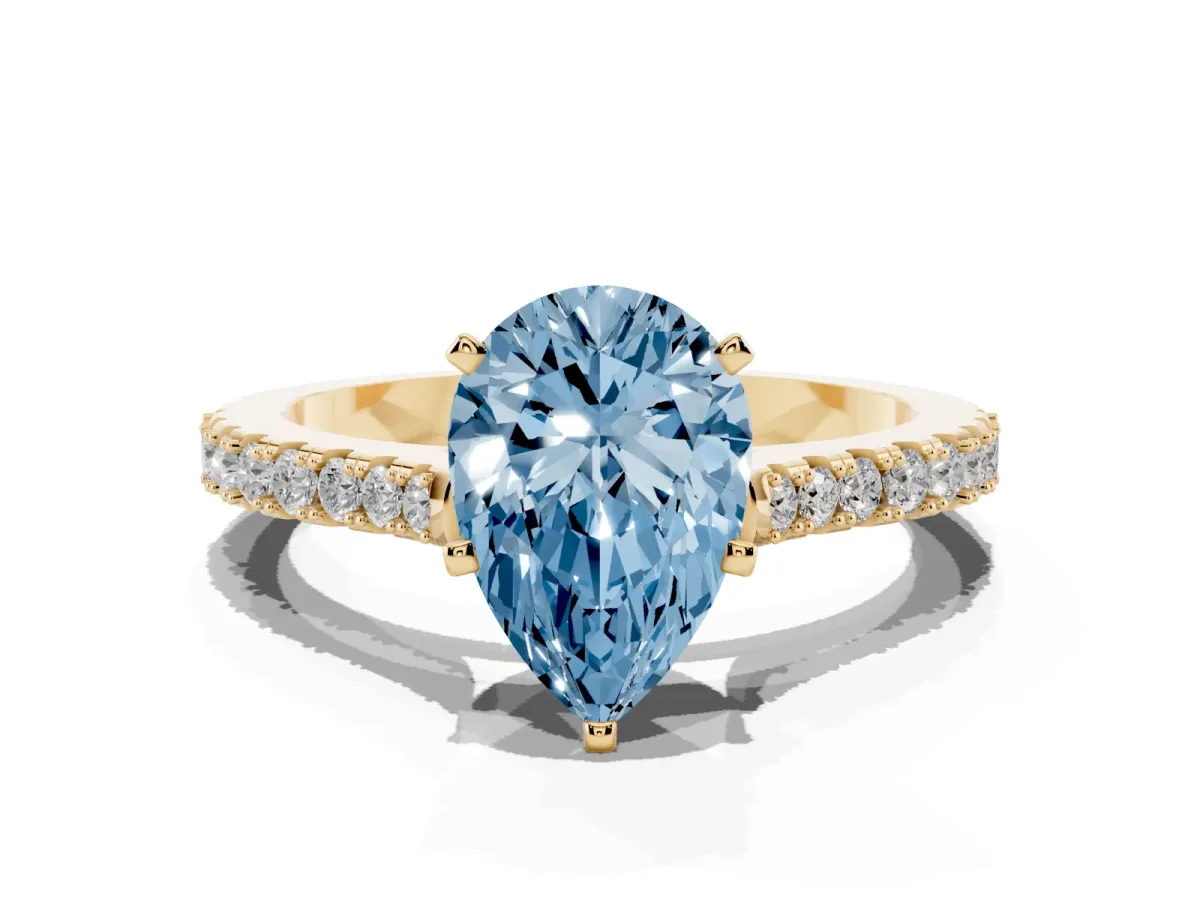 Fancy Blue Pear Cut Cut Solitaire Diamond Engagement Ring with Pave Band and Four-Prong Setting Yellow gold