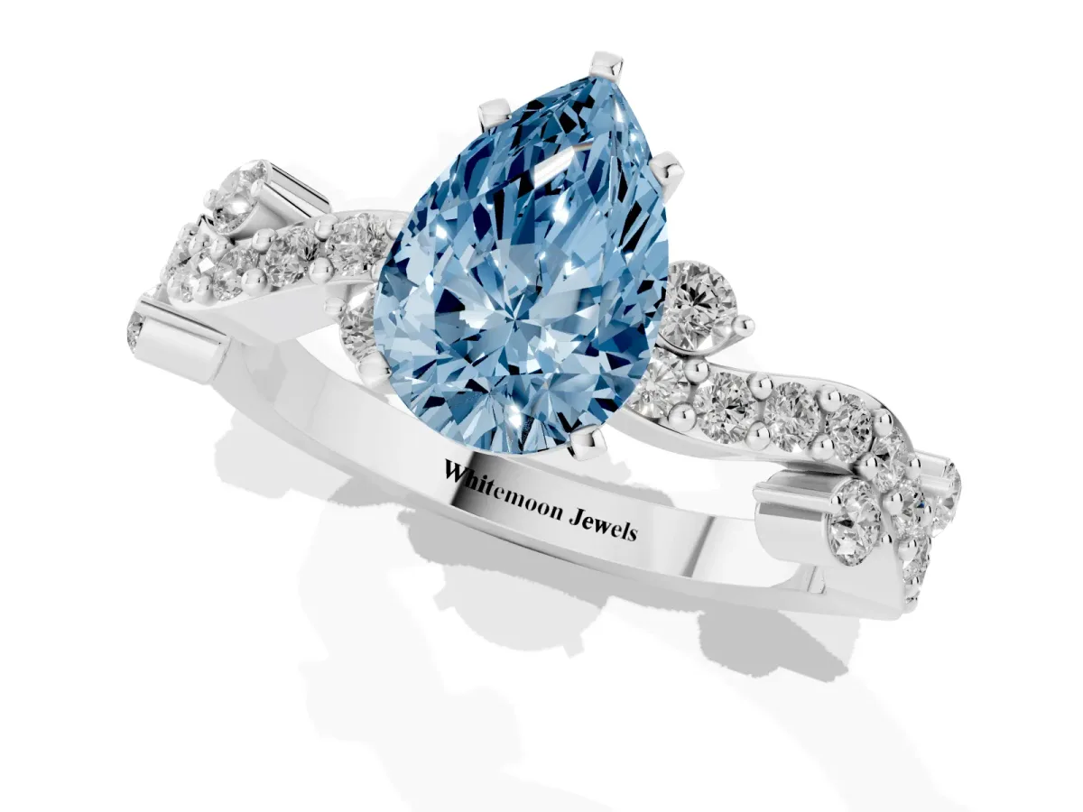 Fancy Blue Pear Cut Cut Solitaire Diamond Twisted Band with Pave Setting Silver