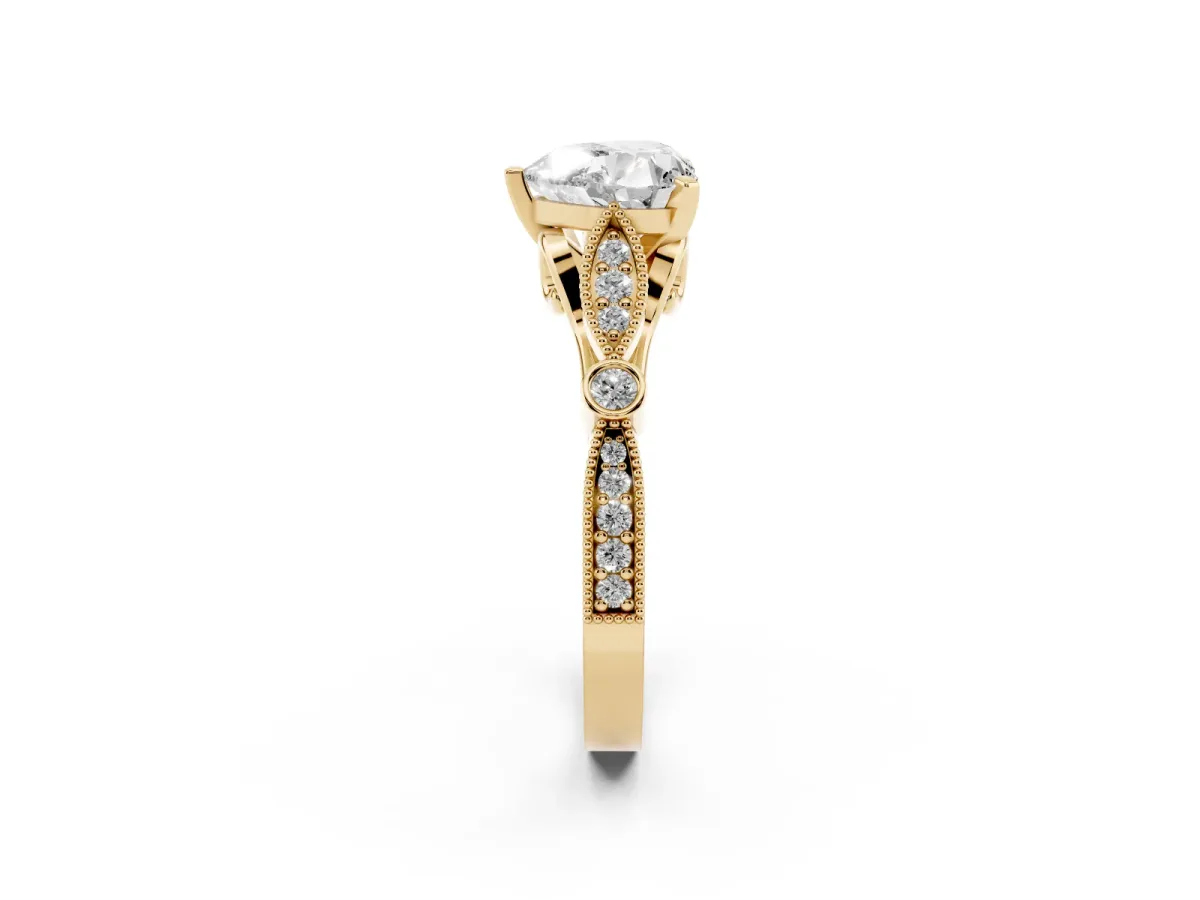 Heart Cut Cut Diamond with Milgrain Marquise and Bezel Accents on a Solitaire Band with Prong Setting Yellow gold