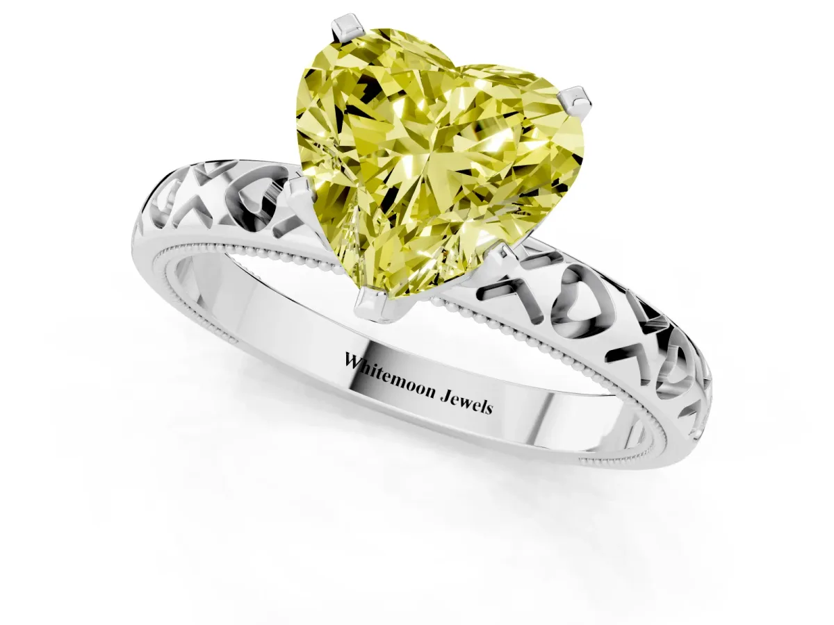 Fancy Yellow Heart Cut Solitaire Diamond Engagement Ring with XO Engraved Band and Four-Prong Setting White gold