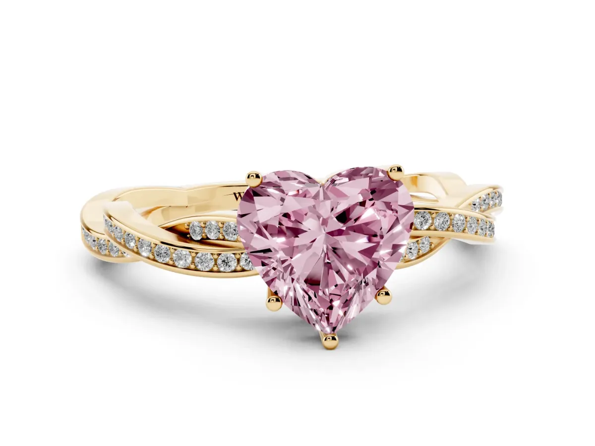 Fancy Pink Heart Cut Solitaire Twisted Pave Diamond Ring with Four-Prong Setting Yellow gold