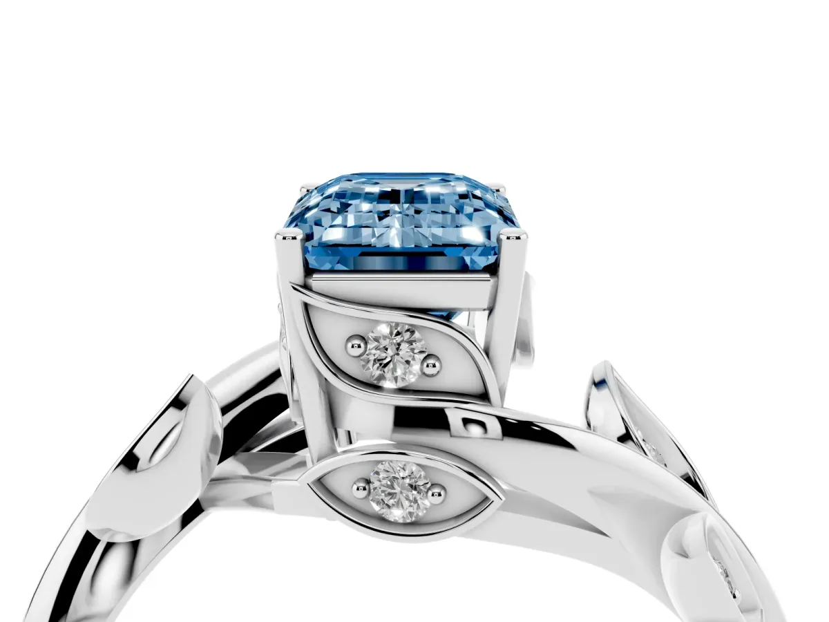 Fancy Blue Emerald Cut Solitaire Twist Engagement Ring with Leaf Accents and Prong Setting Silver