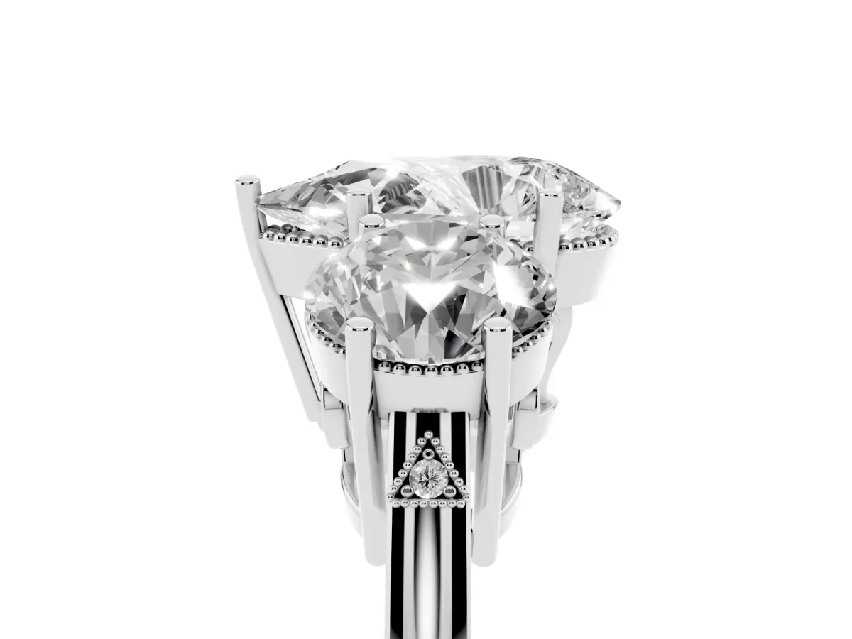 Three-Stone Pear Cut Diamond Engagement Ring with Prong Setting on a Classic Band Silver