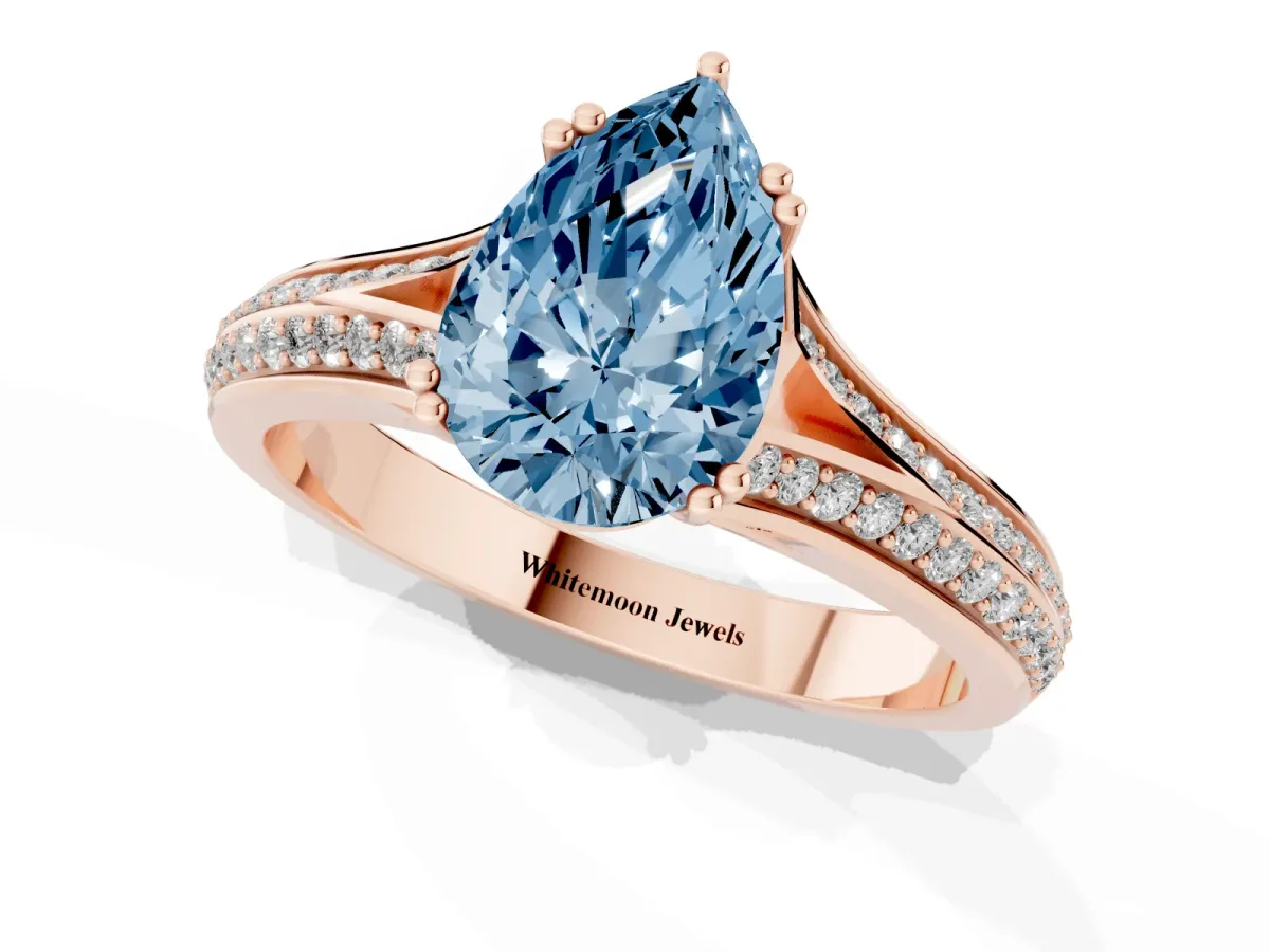 Fancy Blue Pear Cut Diamond Split Shank Engagement Ring with Pavé Band Rose gold